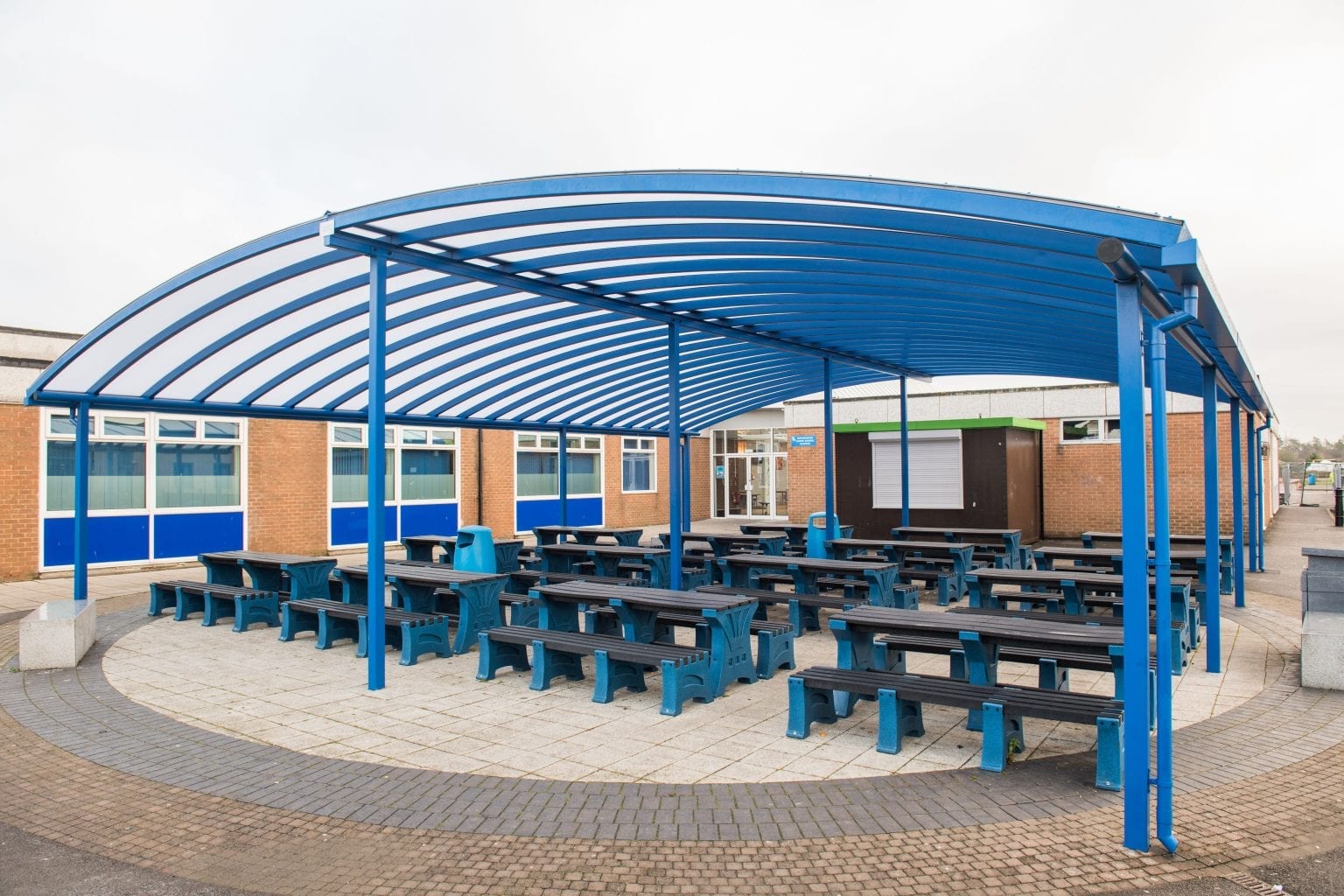 Blue Curved Roof Canopy at Tewkesbury School