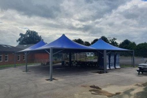 Fabric shelters we installed at Bishop Heber High School