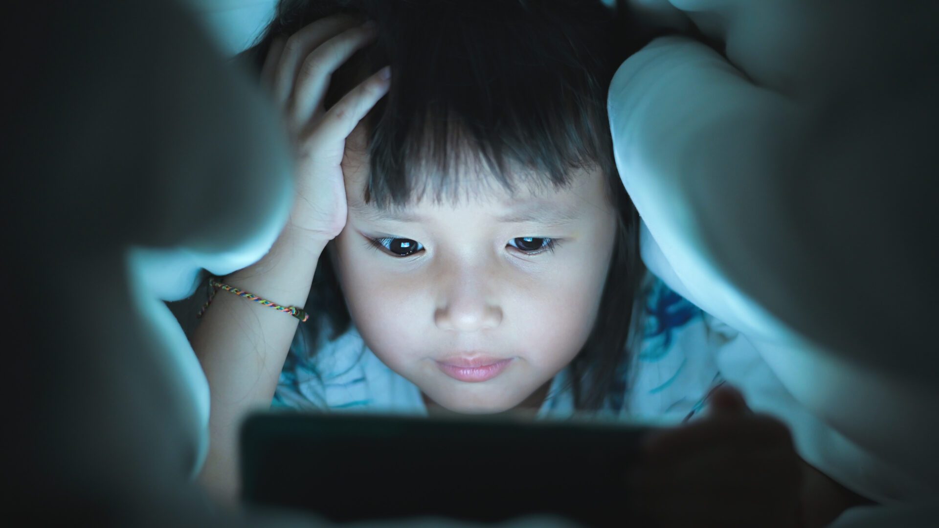 Child watching video on tablet